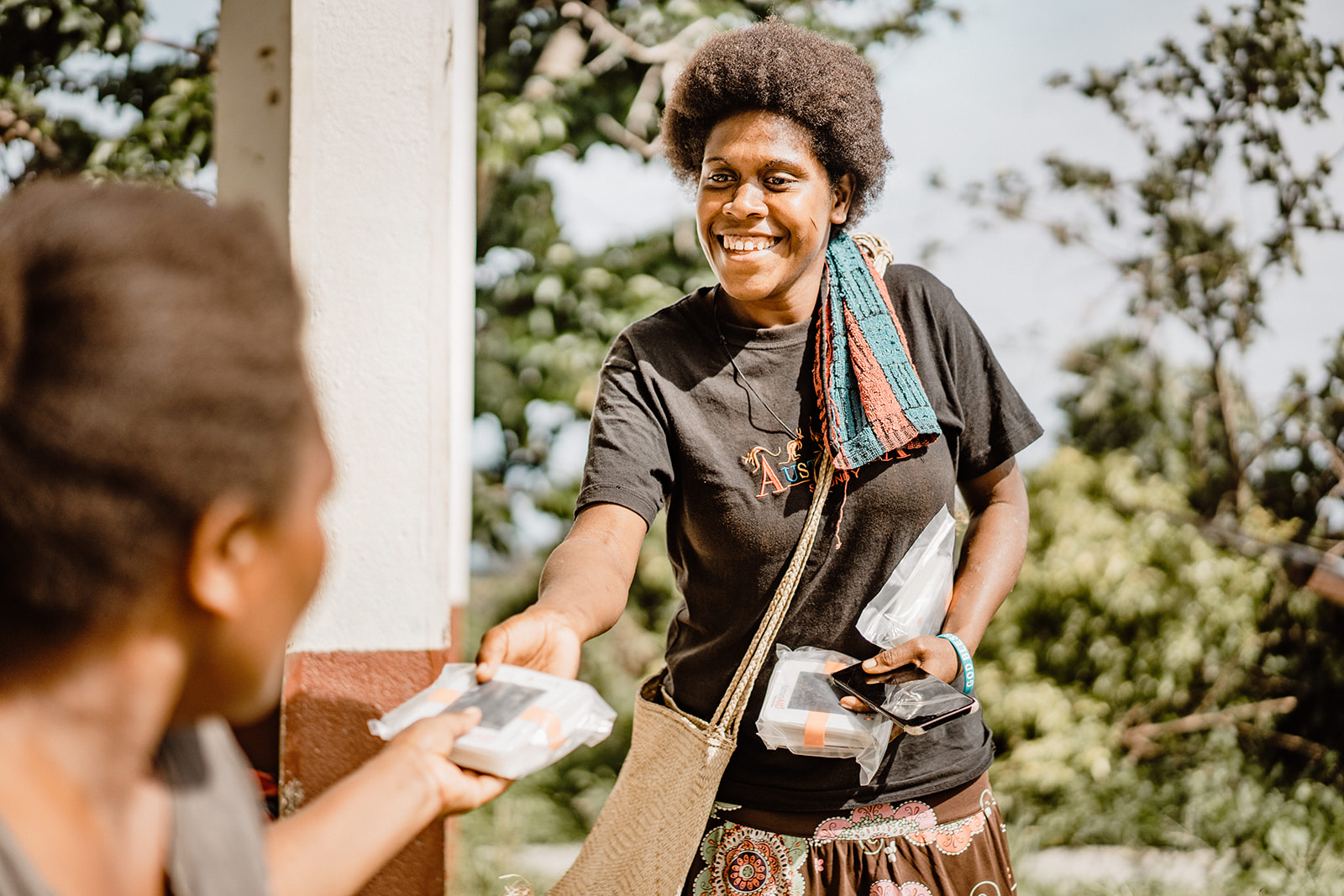 ShelterBox NZ's signature green boxes containing essential aid items, including tents, solar lights, blankets, mosquito nets, and cooking sets, to help families rebuild after their lives have been devastated by disaster.